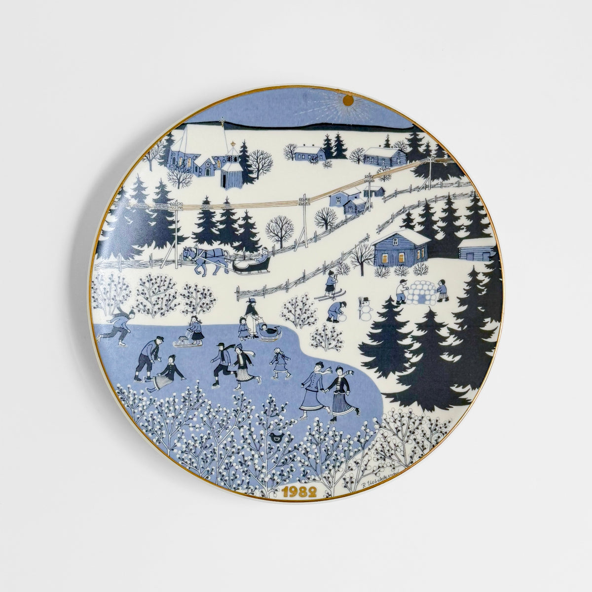 Arabia Finland Christmas Plates (1978-1989) vintage decorative ceramic plate with blue and white winter village scene and skaters by Raija Uosikkinen
