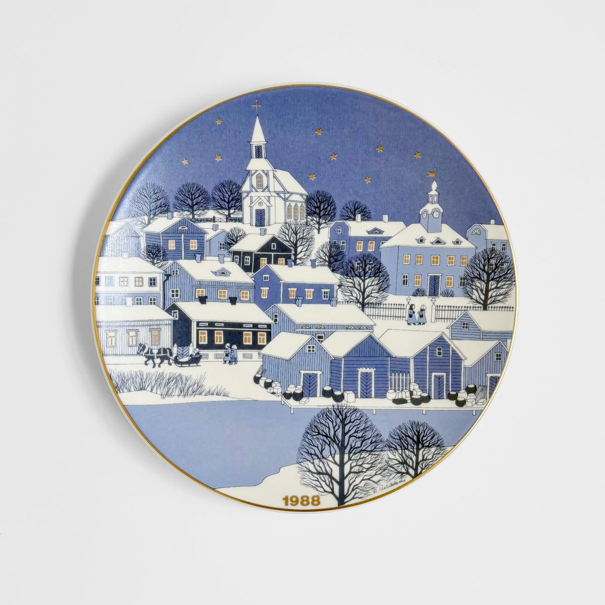Arabia Finland Christmas Plates (1978-1989) decorative plate showing a snowy Scandinavian village beneath a starry blue sky with church and 1988 date