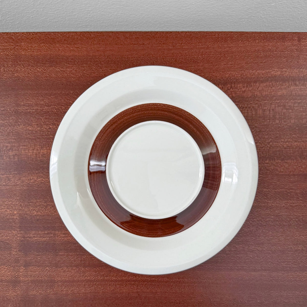 Arabia Finland Faenza Brown Tea Cup Trio Set featuring vintage ceramic cup, saucer, and cake plate with distinctive brown band design on white background, Nordic Wares Store.