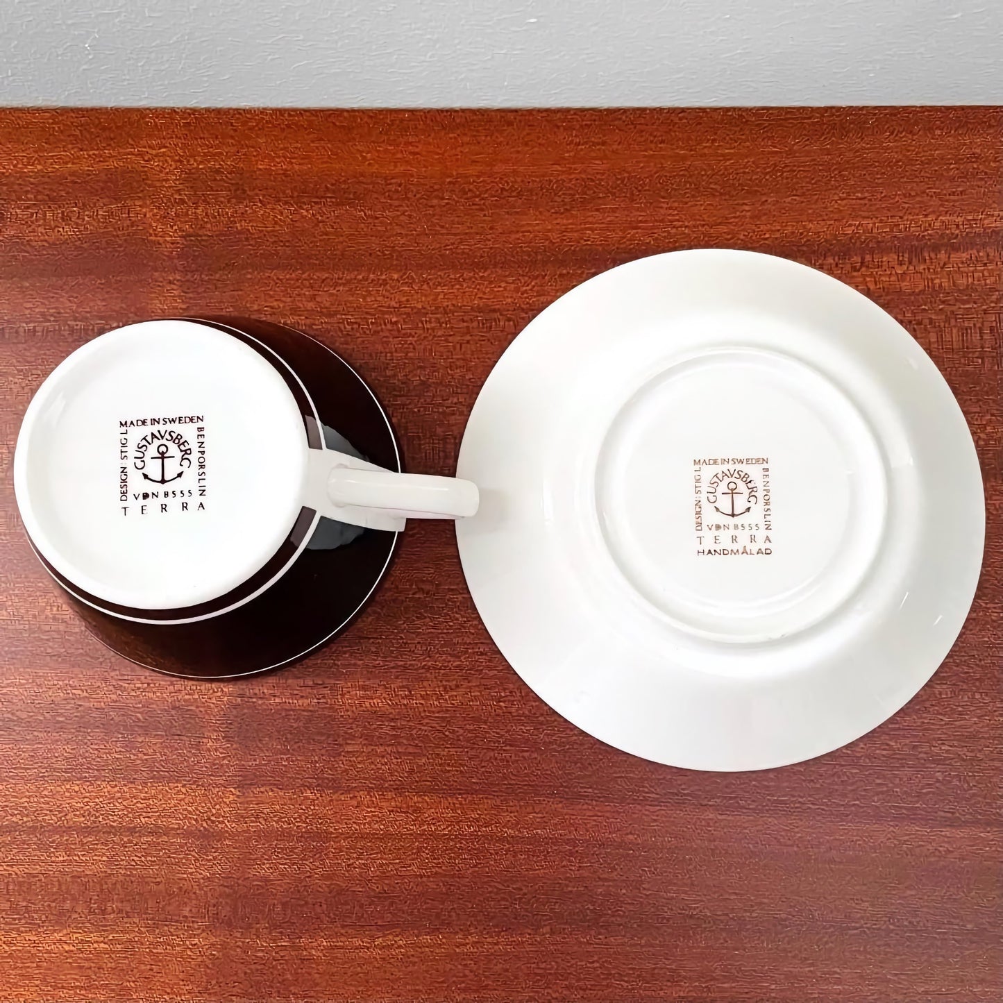 Gustavsberg Terra Tea Cup with Saucer and Creamer showing bottom marks, featuring vintage Swedish ceramic craftsmanship by Stig Lindberg with classic Nordic design.