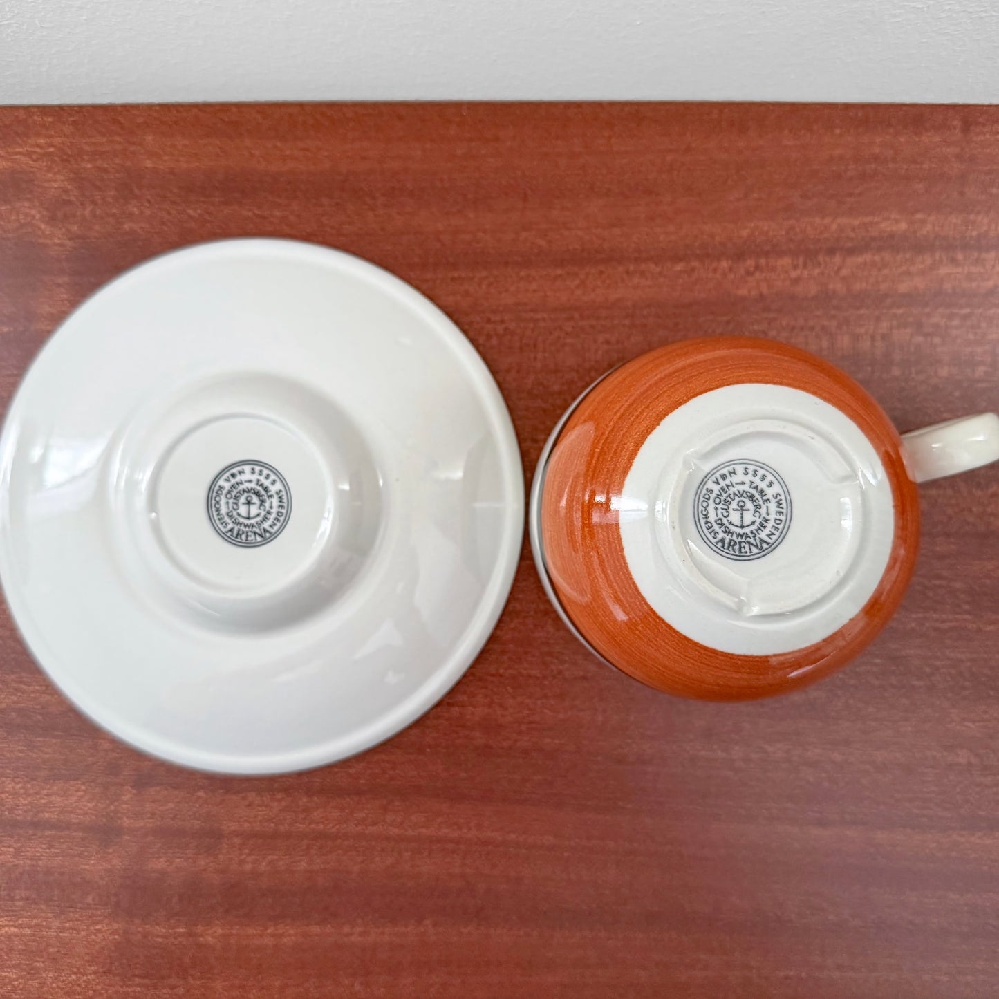 Gustavsberg Arena Tea Cup with Saucer showing the vintage maker’s marks on the bottom, featuring ceramic craftsmanship by Stig Lindberg in classic Scandinavian style.