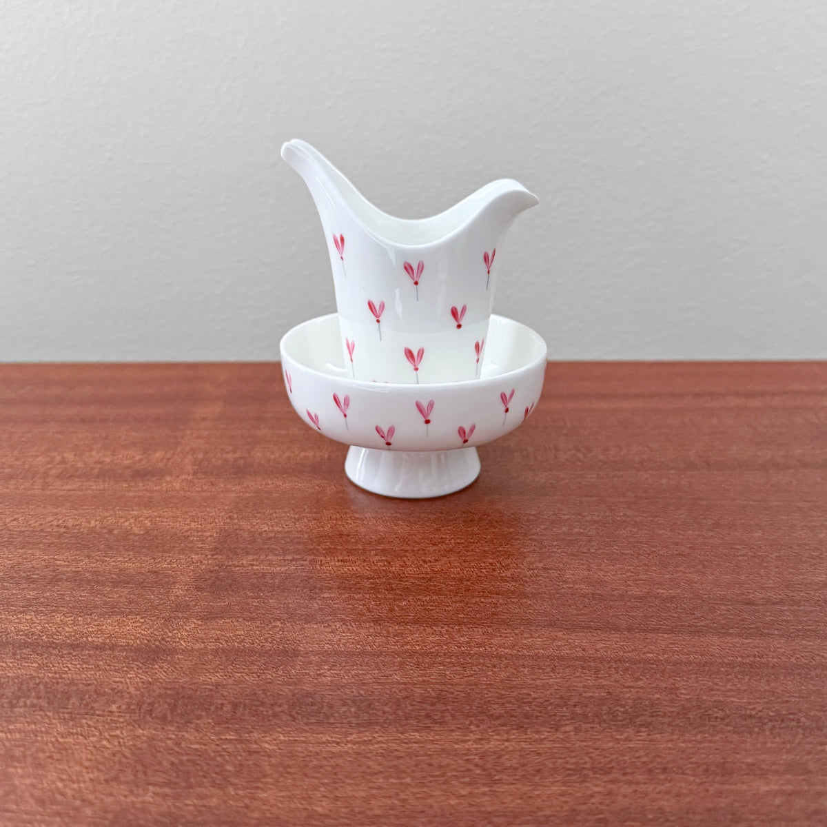 Gustavsberg Rosalin Sugar Bowl and Creamer featuring a white ceramic design with delicate red floral patterns, showcasing vintage Scandinavian craftsmanship by Stig Lindberg.