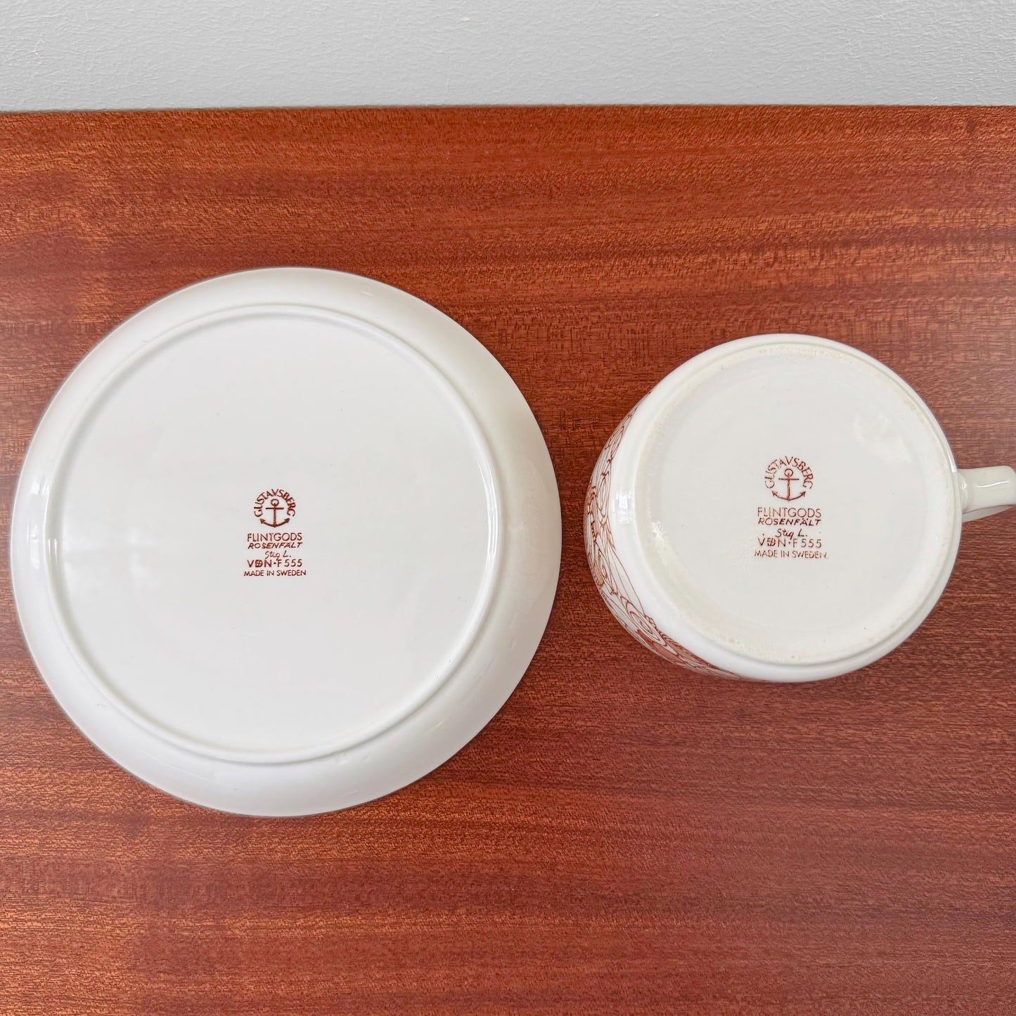Gustavsberg Rosenfält Tea Cup with Saucer shown from the bottom, displaying maker’s mark and vintage ceramic Scandinavian craftsmanship by Stig Lindberg.