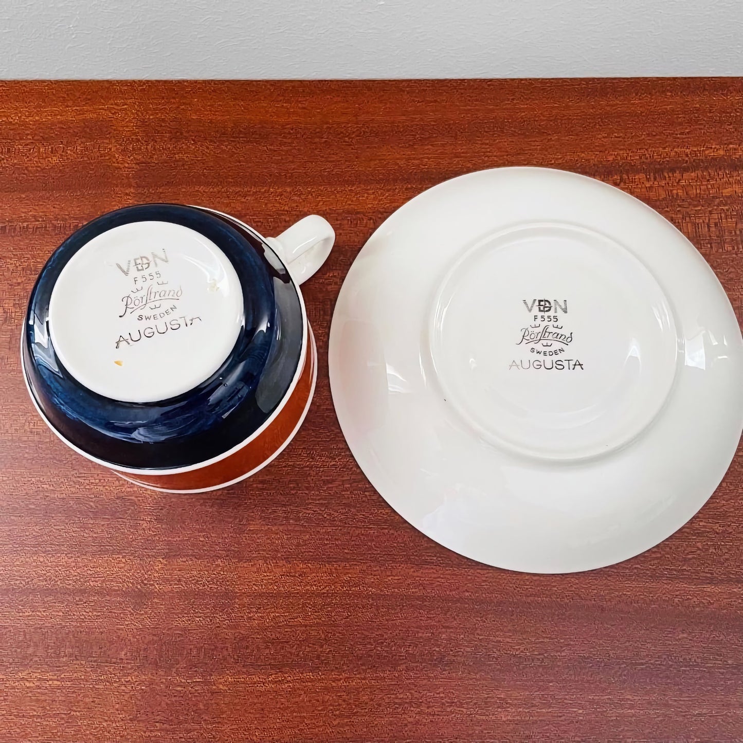 Rörstrand Augusta Tea Cup with Saucer shown from the bottom, displaying vintage markings on ceramic in classic Nordic design.