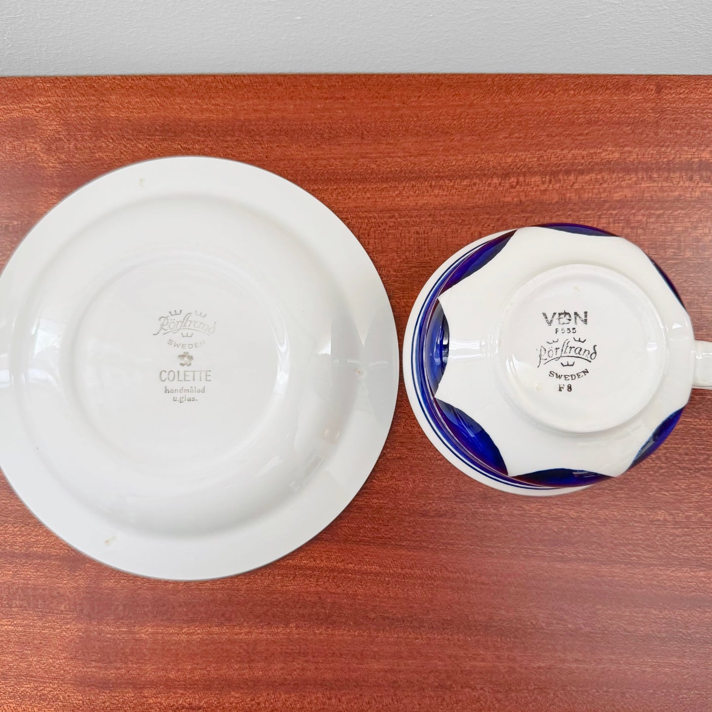 Rörstrand Colette Large Tea Cup with Saucer showing vintage maker's marks on ceramic surfaces, highlighting authentic Nordic craftsmanship from Sweden.