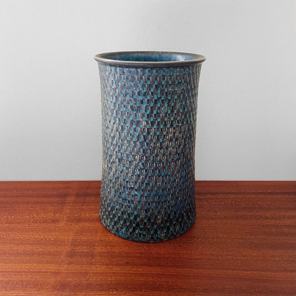Stig Lindberg Gustavsberg Turquoise Stoneware Vase with textured blue ceramic surface, showcasing vintage Nordic craftsmanship and unique Scandinavian design.