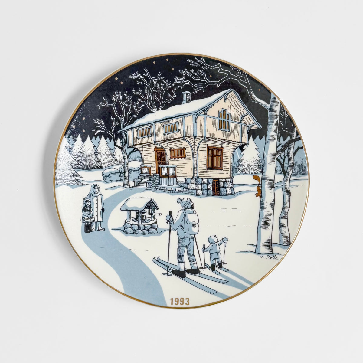 Arabia Finland Christmas Plates (1990-1997) vintage ceramic decorative plate showing a snowy Nordic cabin scene with skiers and trees by Tove Slotte