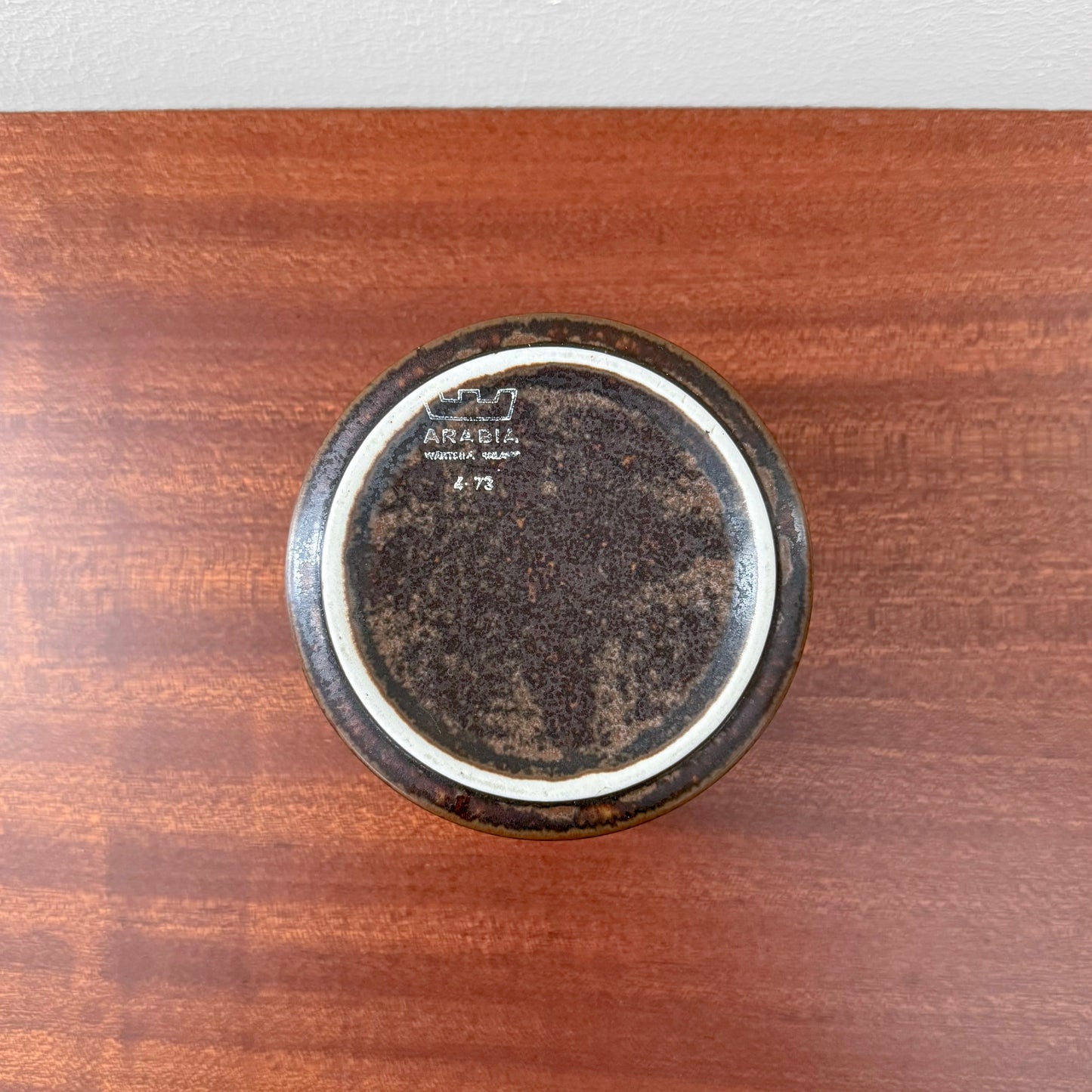 Bottom view of Arabia Finland Ruska Sugar Bowl showing the vintage maker’s mark and textured dark brown ceramic glaze characteristic of mid-century Nordic tableware.