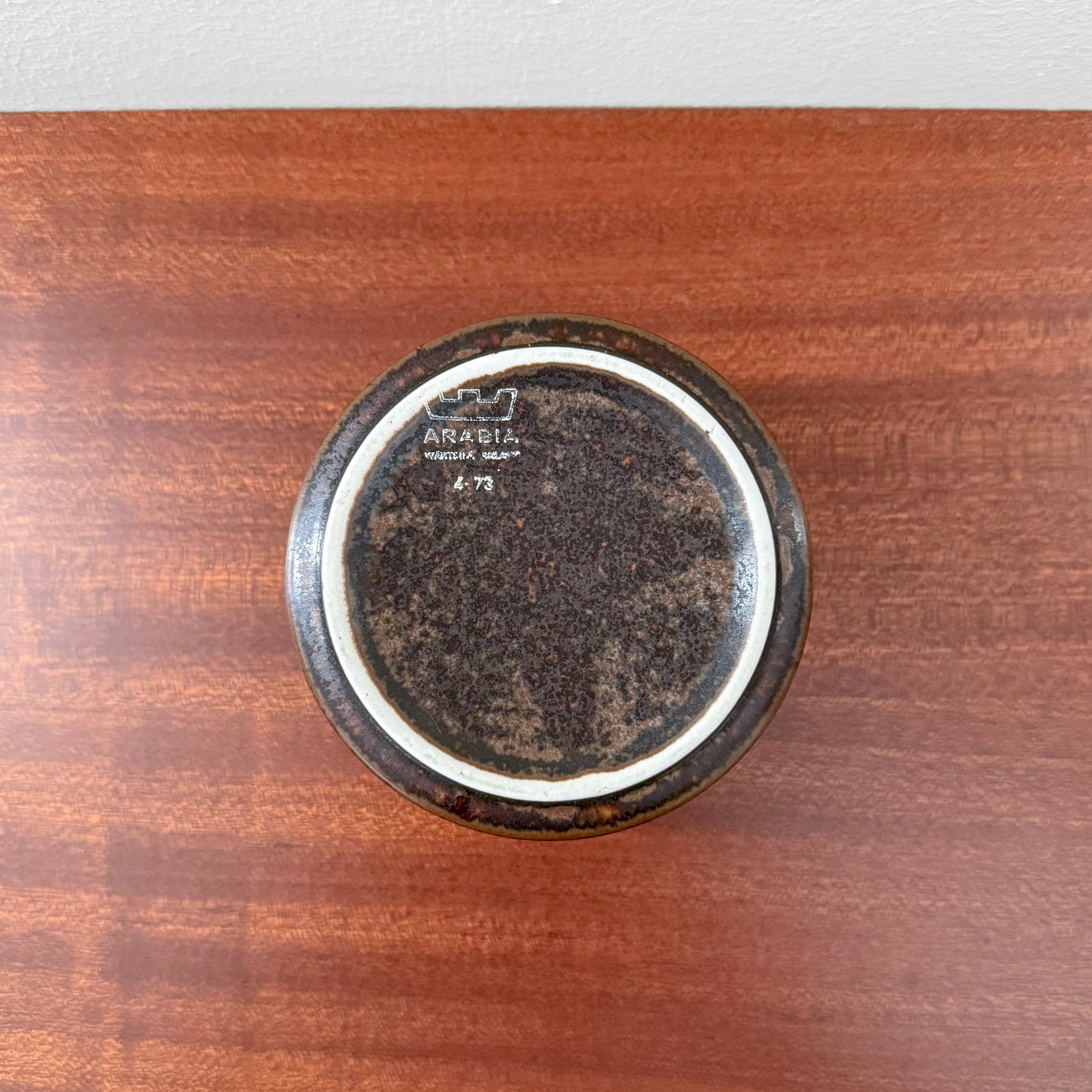 Bottom view of Arabia Finland Ruska Sugar Bowl showing the vintage maker’s mark and textured dark brown ceramic glaze characteristic of mid-century Nordic tableware.