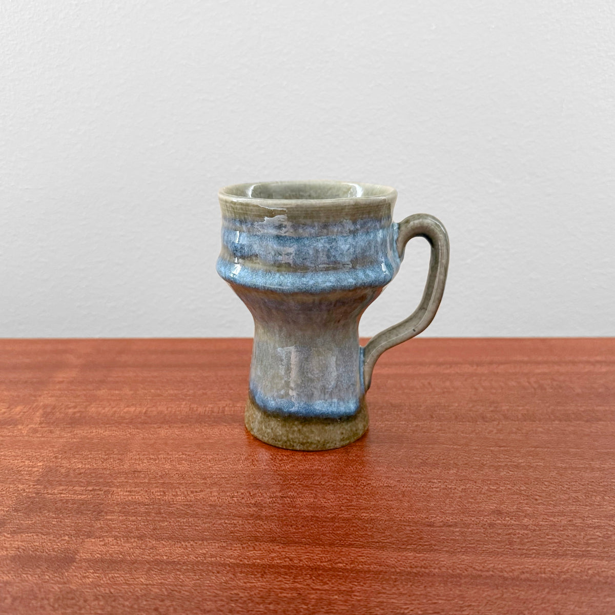 Carl-Harry Stålhane Rörstrand STH Green-Blue Stoneware Candle Holder in ceramic with green and blue glaze, featuring a handle, vintage Nordic design from 1950s-60s.