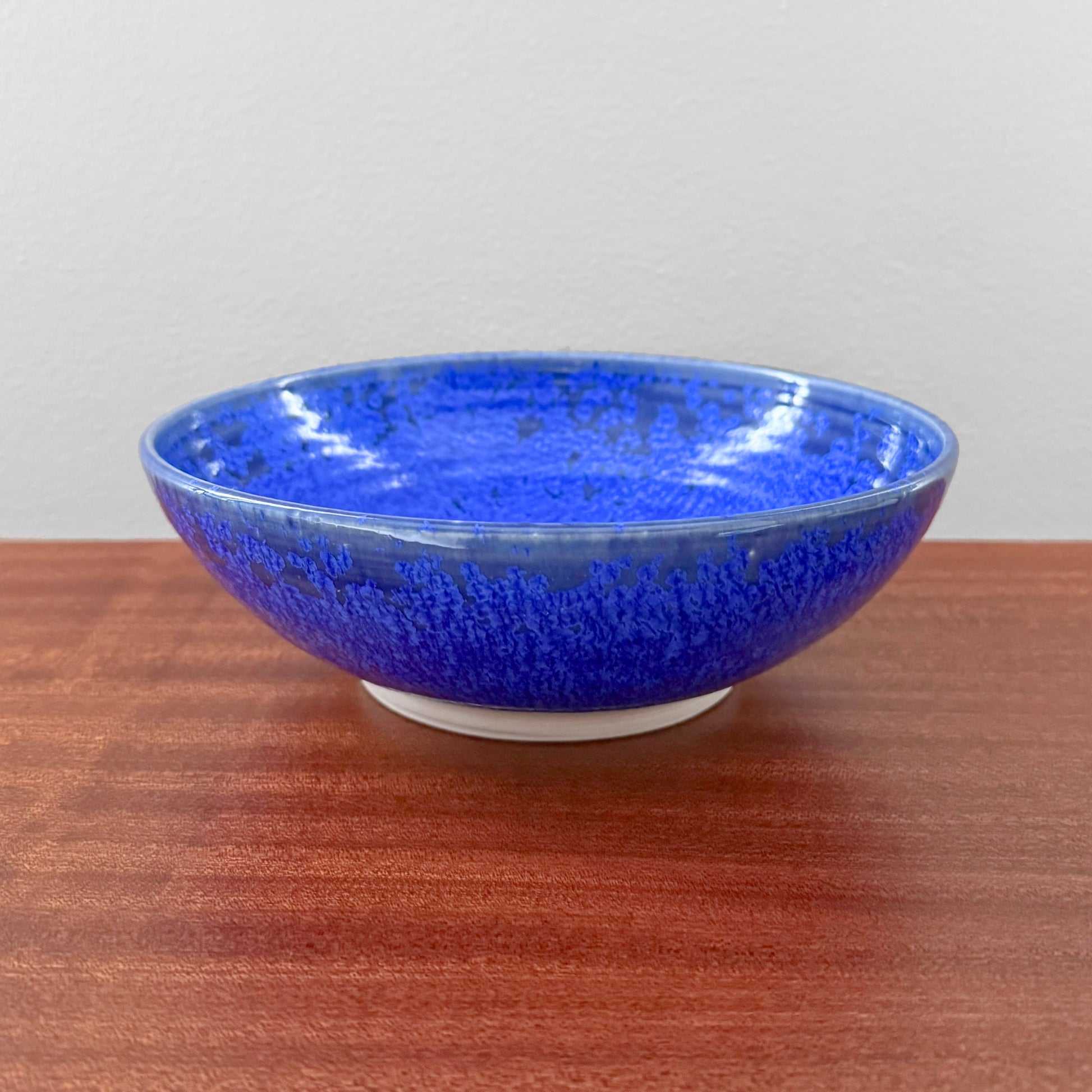 Danish Cobalt Blue Stoneware Decorative Bowl in vibrant blue glaze on a wooden table vintage Danish stoneware for Nordic home decor