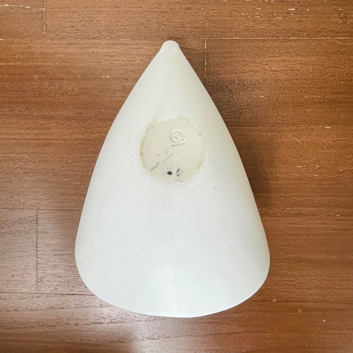 Bottom view of a rare vintage Gustavsberg Veckla Stoneware Decorative Bowl showing stoneware material and maker's mark on a wooden surface.