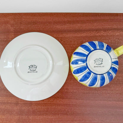 Hertha Bengtson Rörstrand Tea Cup with Saucer showing the underside with vintage maker’s marks, featuring blue and yellow hand-painted Scandinavian ceramic design.