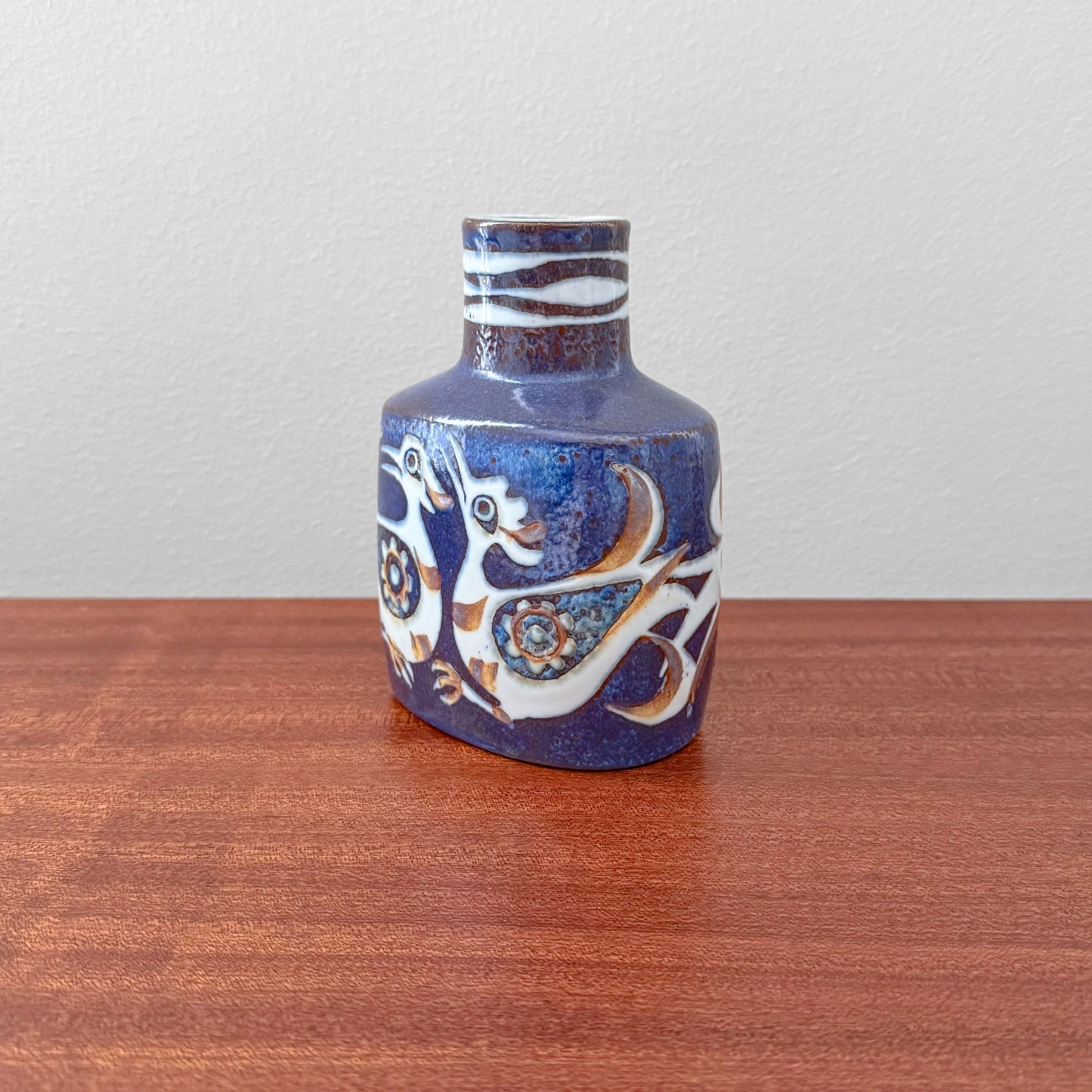 Nils Thorsson Royal Copenhagen Baca Small Blue Vase (708/3207) in ceramic with a stylised bird motif and blue glaze