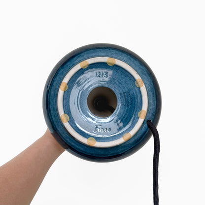Bottom view of the Søholm 1213 Blue Stoneware Table Lamp showing the blue ceramic base with maker's stamp and fabric-covered cord.