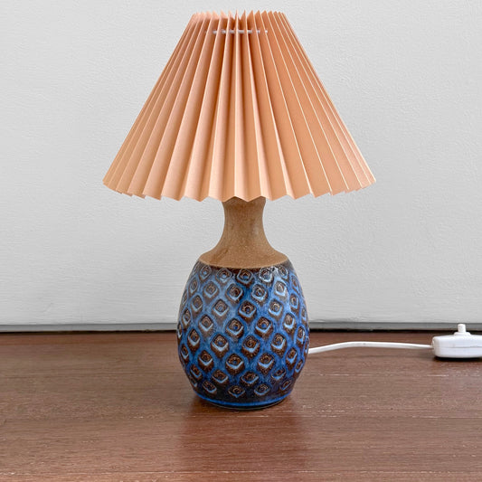 Søholm Blue Stoneware Table Lamp with a textured blue ceramic base and a new plastic pleated shade, inspired by vintage Nordic Scandinavian design.