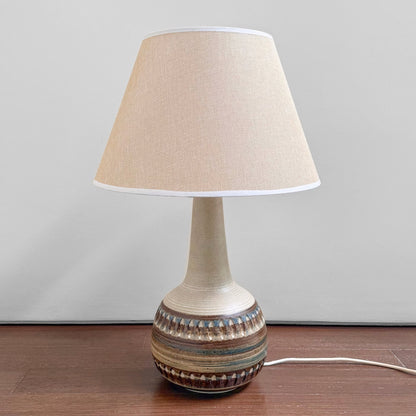 Søholm 3070 Large Earthy Stoneware Table Lamp featuring a vintage ceramic base with earthy glaze and a new beige fabric shade, showcasing Scandinavian craftsmanship from Denmark.