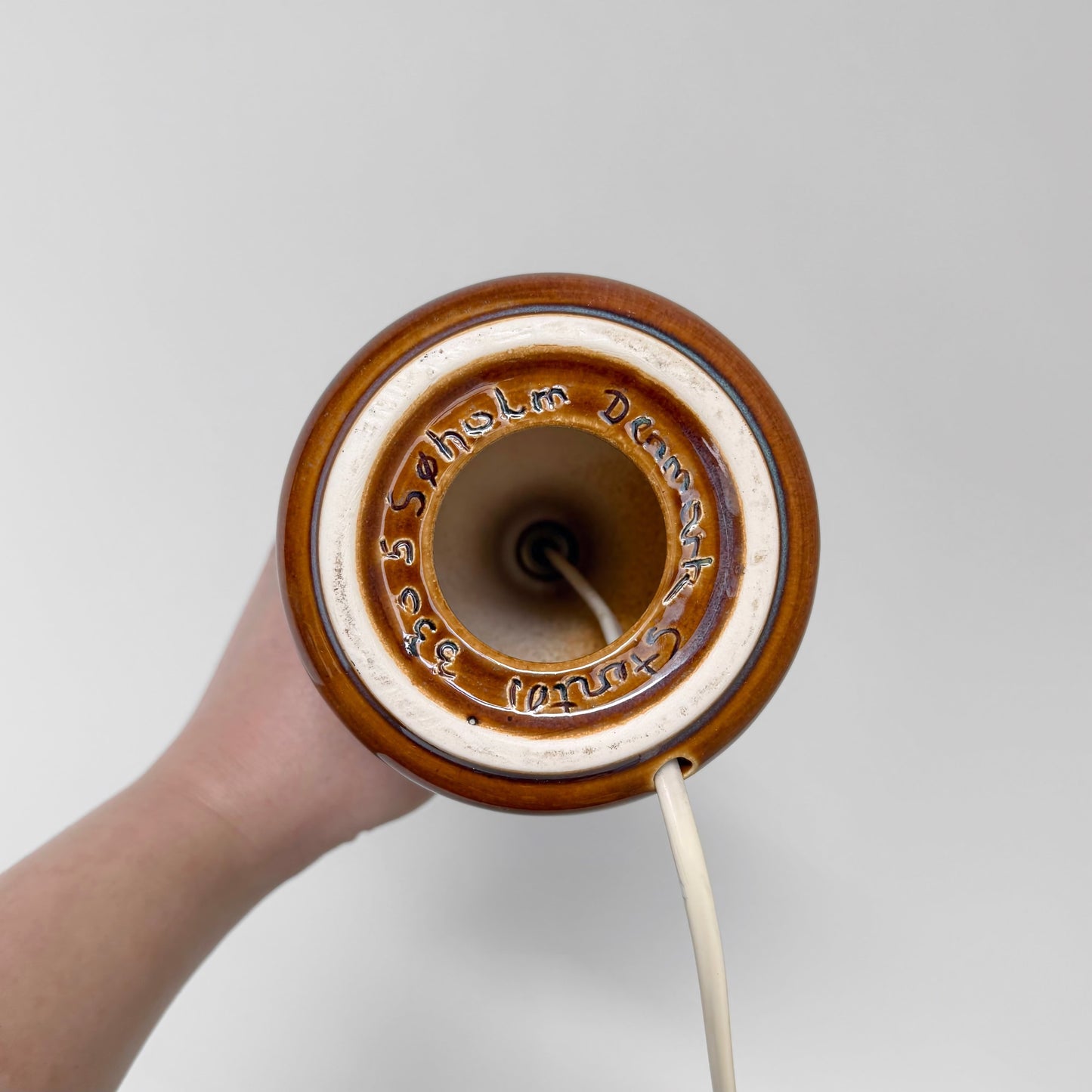 Underside of Søholm Manilla Blue-Green Stoneware Table Lamp showing ceramic base with embossed Søholm Denmark Stentøj 3305 mark and attached power cord.