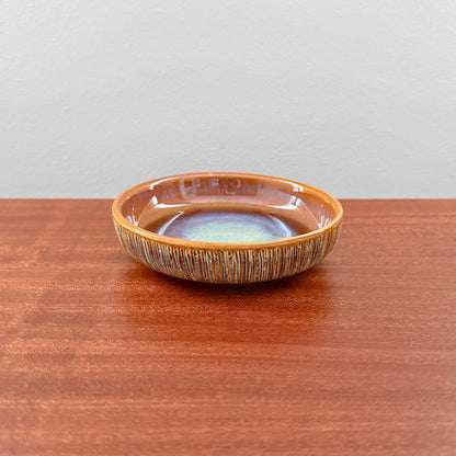 Søholm Manilla Small Stoneware Decorative Dish in warm brown glaze with textured sides and subtle blue-green center, showcasing vintage Nordic ceramics craftsmanship.