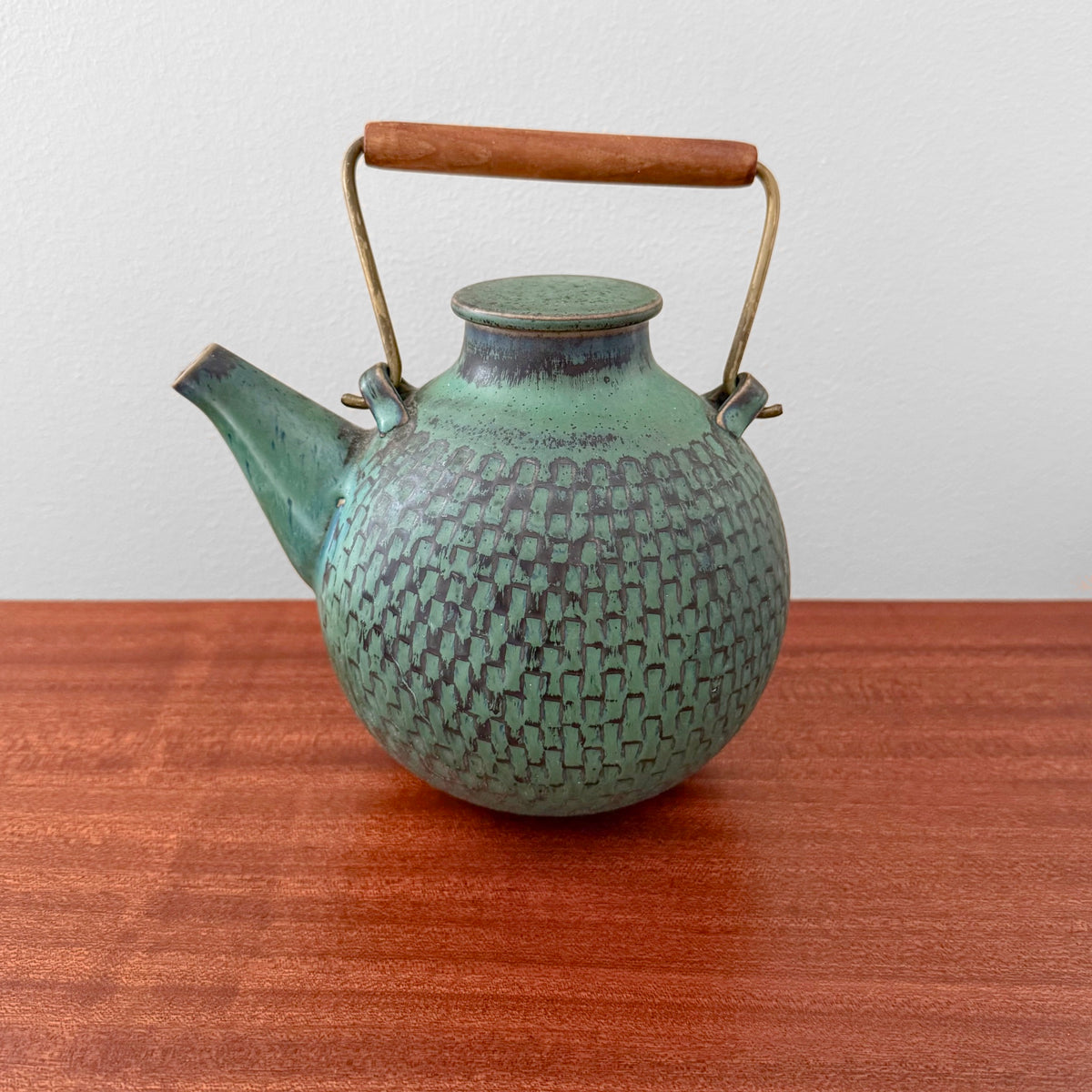 Stig Lindberg Gustavsberg Turquoise Stoneware Teapot in textured turquoise stoneware with brass and teak handle vintage Swedish drinkware