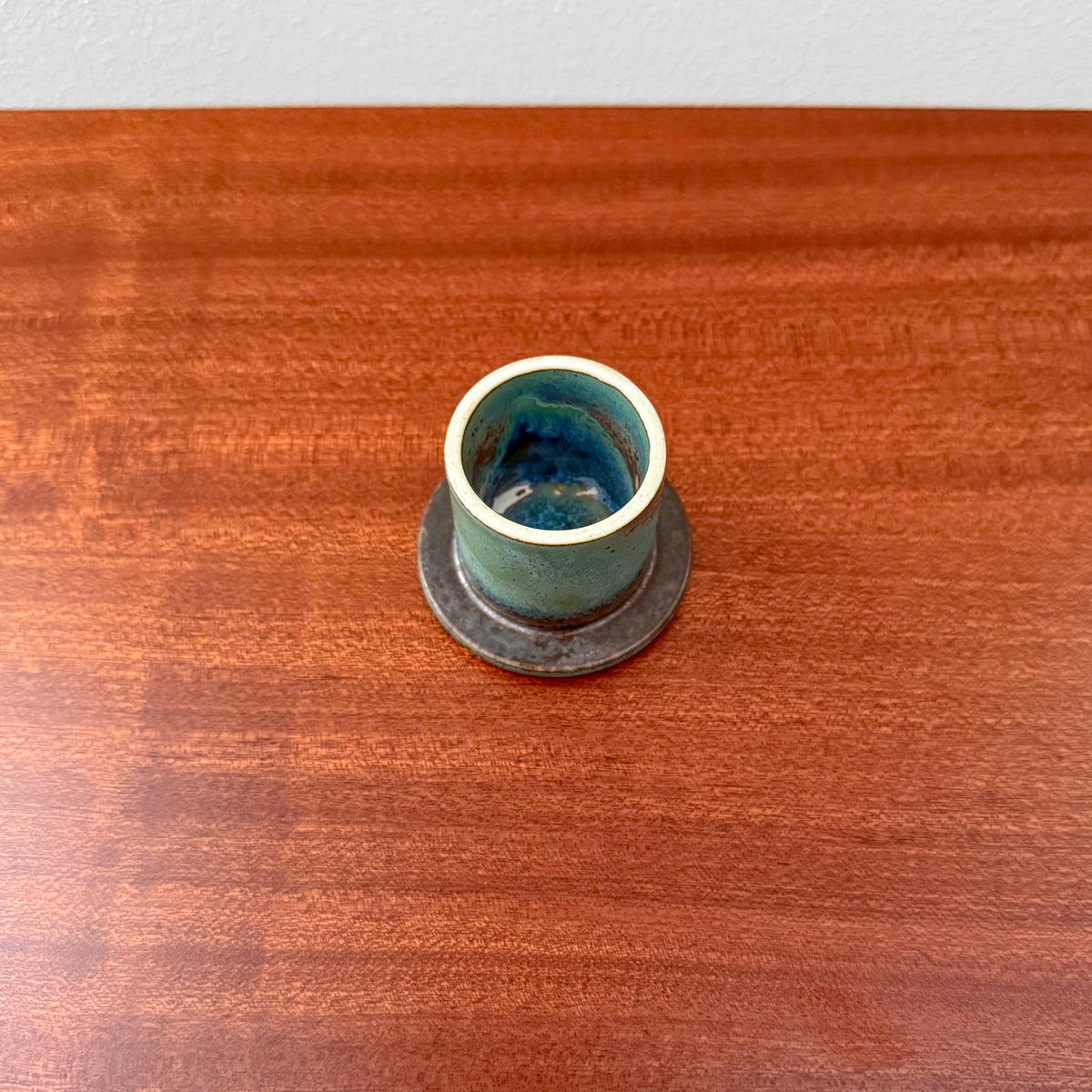 Stig Lindberg Gustavsberg Turquoise Stoneware Teapot with turquoise glazed stoneware and dark blue interior displayed on a wooden table