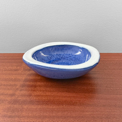 Swedish Blue Decorative Bowl in rich blue glaze with a white rim displayed on a wooden surface as vintage Scandinavian home decor